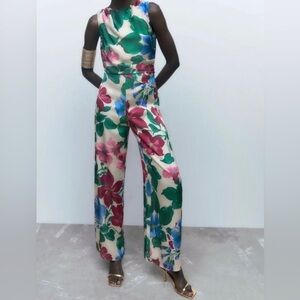ZARA WOMAN LONG FLORAL SATIN
WIDE-LEGS JUMPSUIT MULTICOLOR OPEN BACK SIZE XS NWT